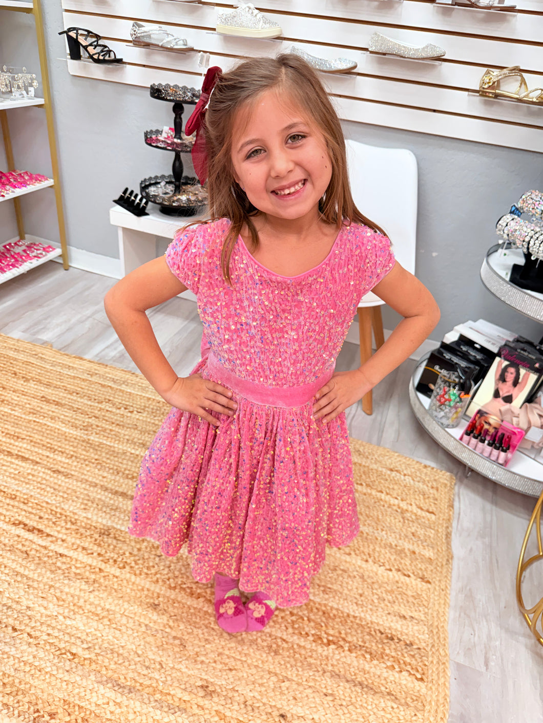 Pink sequin girl's dress with velvet bow