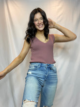 Mid rise tinted wash jeans