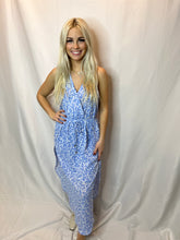 Floral dress with wrap slit.