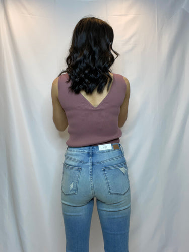 Mid rise tinted wash jeans